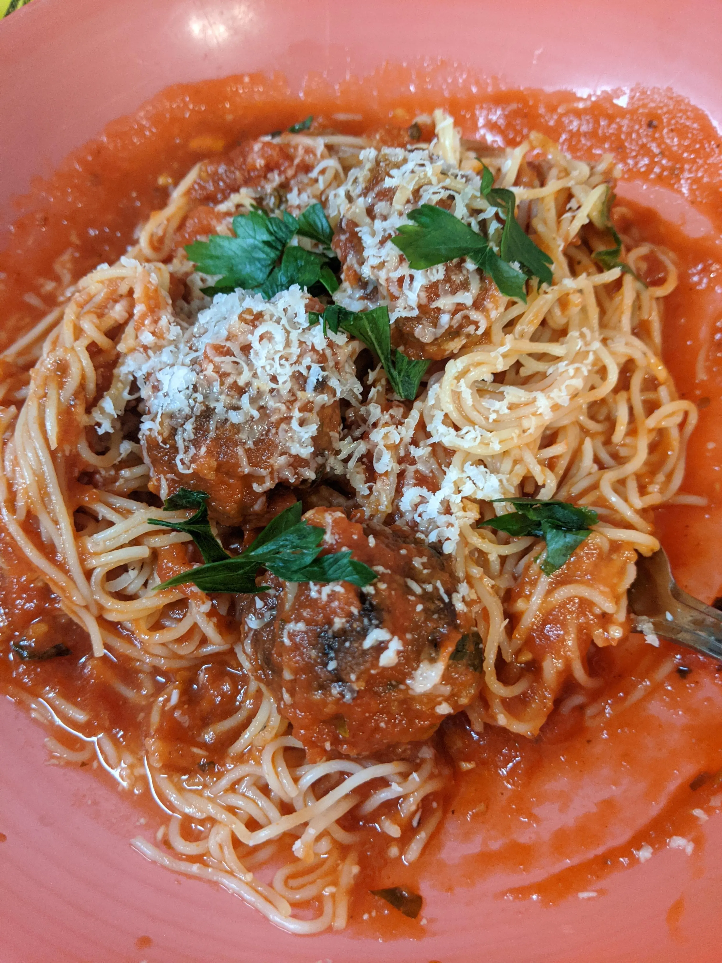 Amateur phone photo of spaghetti before AI enhancement